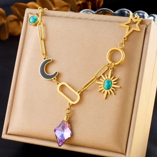Himmlische Eleganz: Vergoldete Halskette mit Mond, Sonne, Stern & Kristall